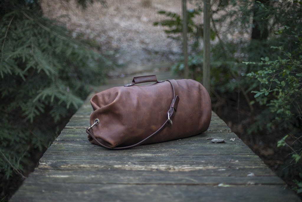 The Rugged History of Duffle Bags - Go Forth Goods